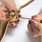 Elegant Winged Orb Ring Box – Opulent Moving Jewelry Organizer